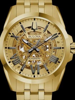 Bulova Gold Skeleton Dial Automatic Watch with Dark Accents